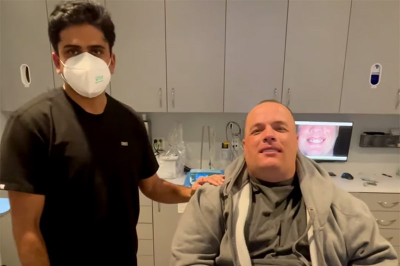 Dr. Dalla with his patient during dental consultation