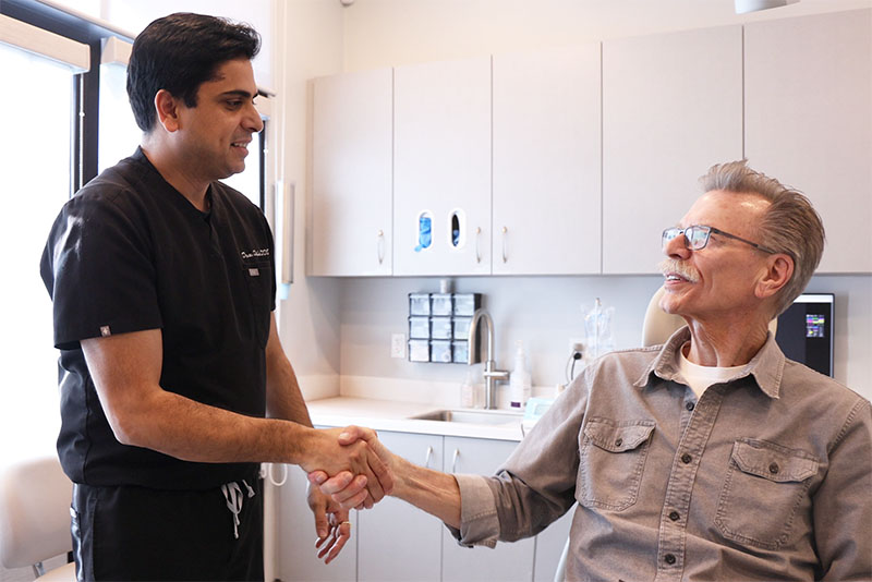 Dr Dalla with Patient